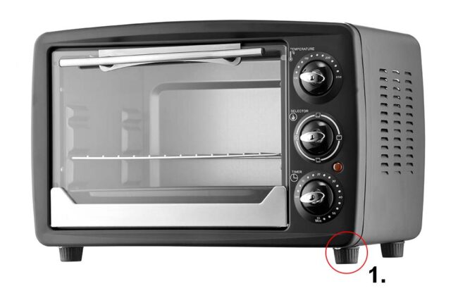 Microwave in black with four feet, isolated on white background