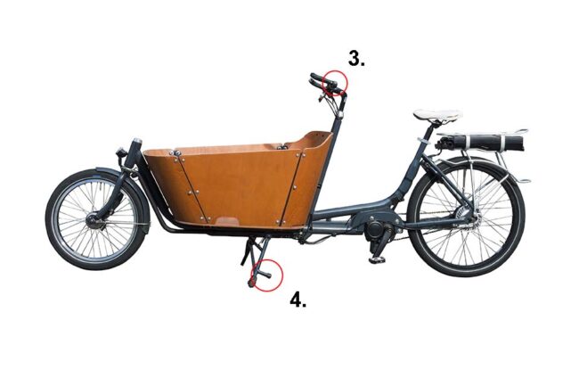 Freight bike with solid wooden transport box, with covering plugs and caps, isolated on white background