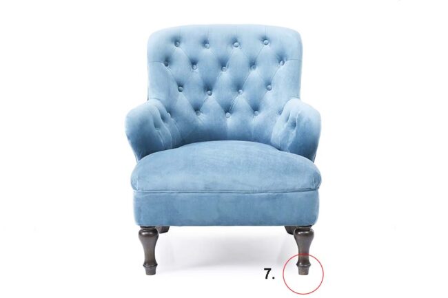 Granny armchair with blue upholstery with floor protectors,isolated on white backround