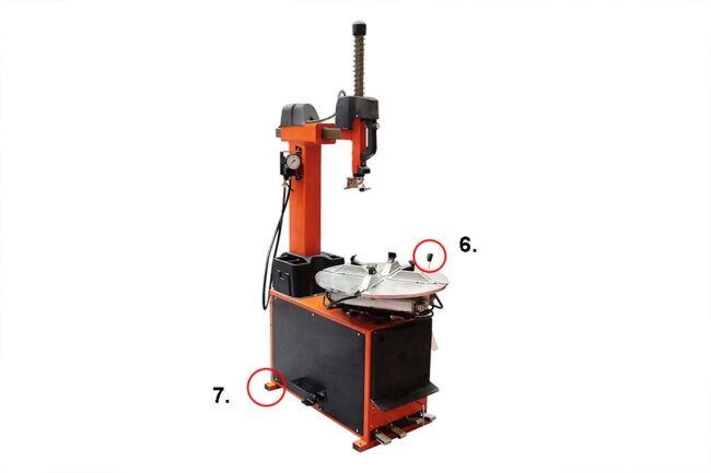 Image of a tyre changer with handles and handwheels, on a white background