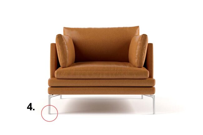 Modern leather armchair in light brown-orange colouring with steel legs