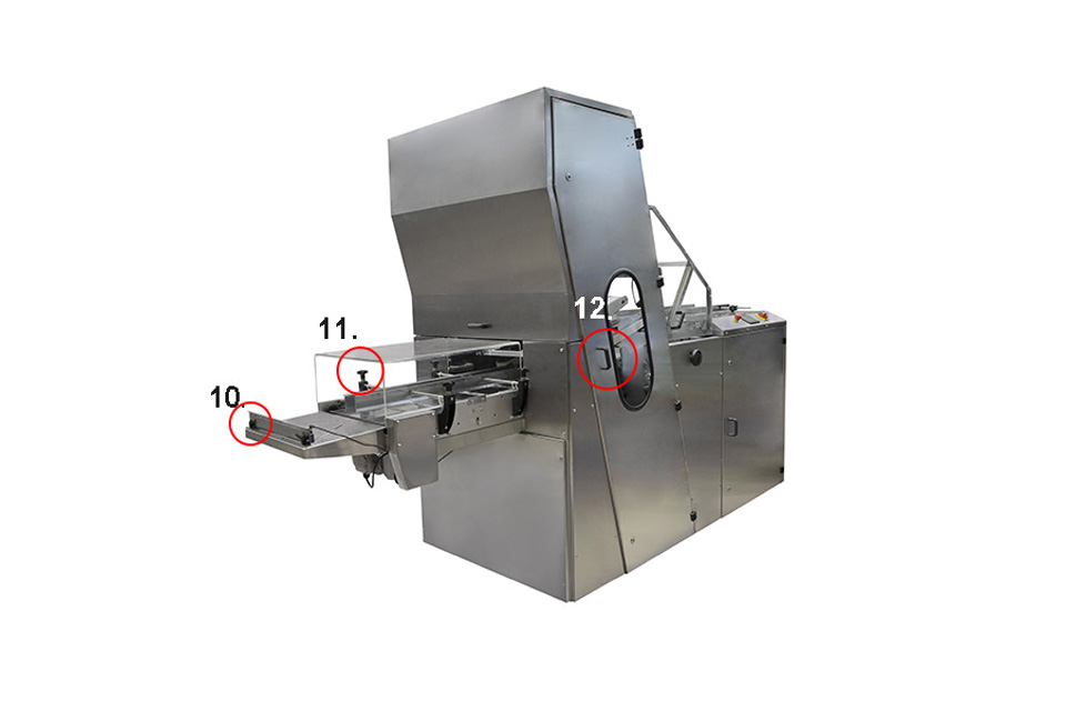A bread-making machine photographed from the side against a white background