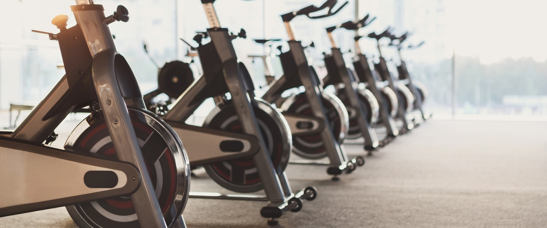 Modern gym interiors featuring fitness equipment